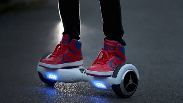 A boy Ride on RIDEO 6.5 inch Hoverboard XT65 Self Balance Electric Hoverboard LED Kids effortlessly blog image