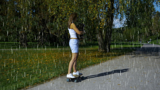 Girl riding rideo skateboard in park