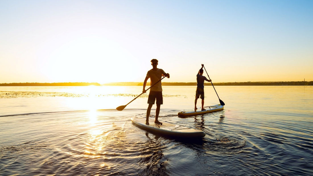 Two people on rideo surf board