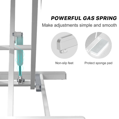 Close-up of the gas spring mechanism of a white desk converter showcasing non-slip feet and a protective sponge pad to prevent damage.